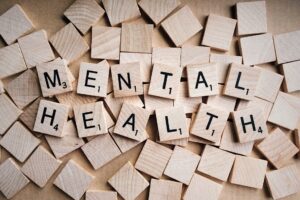 scrabble tiles spell out mental health