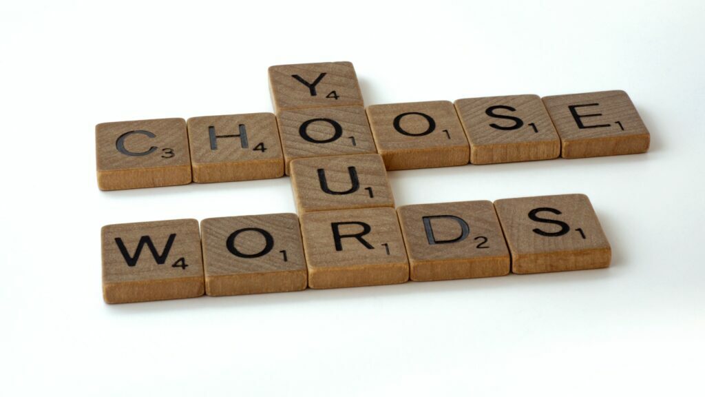 scrabble words read 'choose your words'.